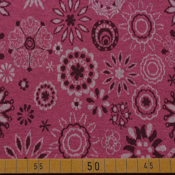 Rosa Strickstoff mit floralem Muster – 65% Polyester, 35% Viskose, 140 cm breit, 215 g/m².